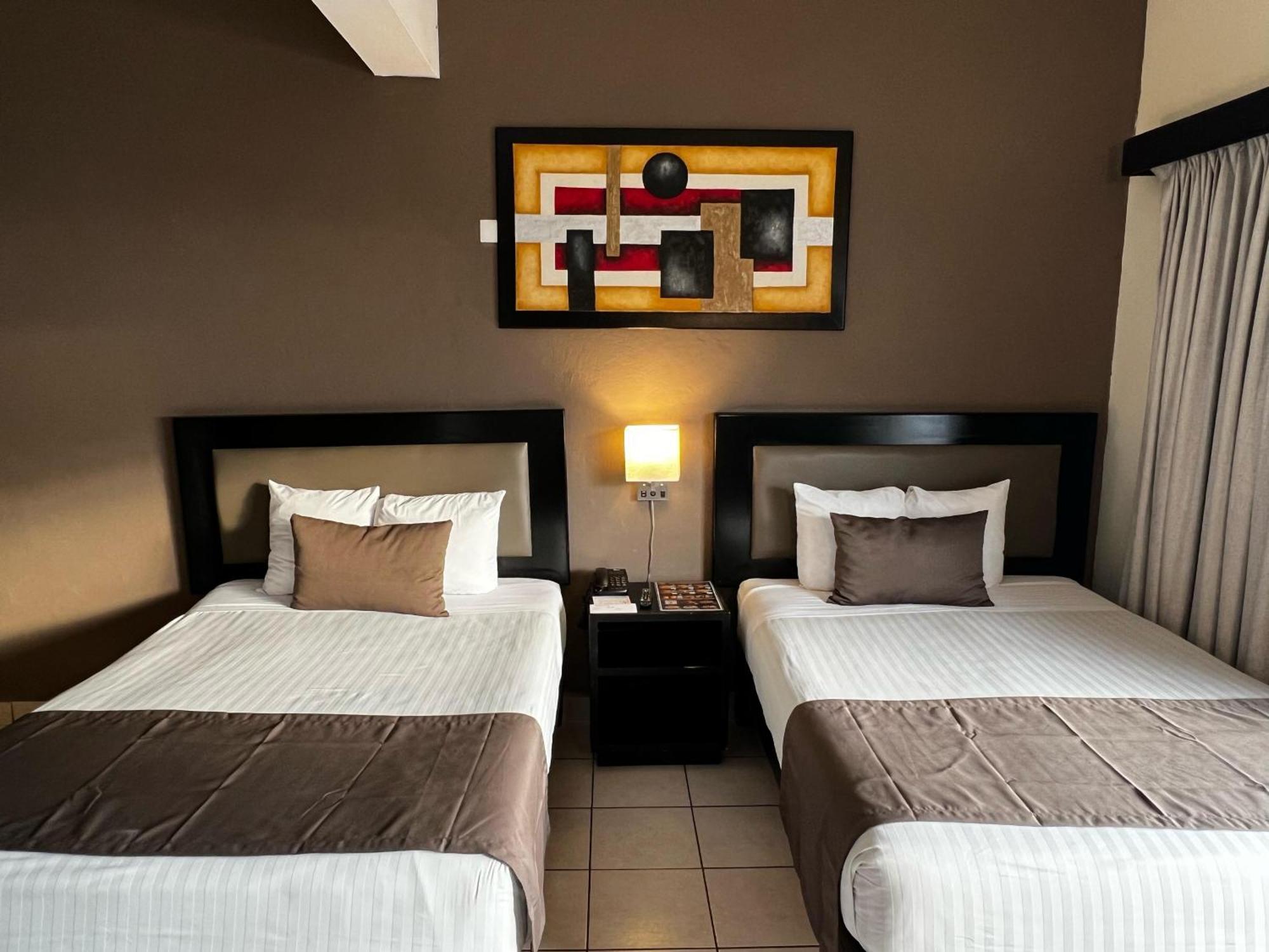 Hotel La Siesta Malecon Mazatlán Rom bilde
